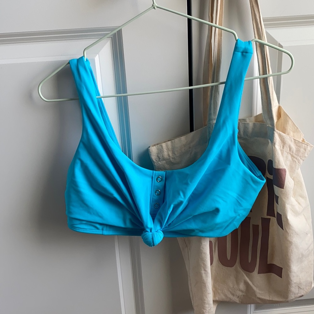 bright blue bikini top with button detail!